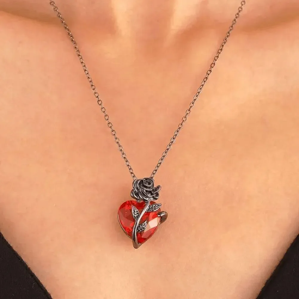 Gothic Gun Metal Rose Wrapped Around Ruby Heart Necklace